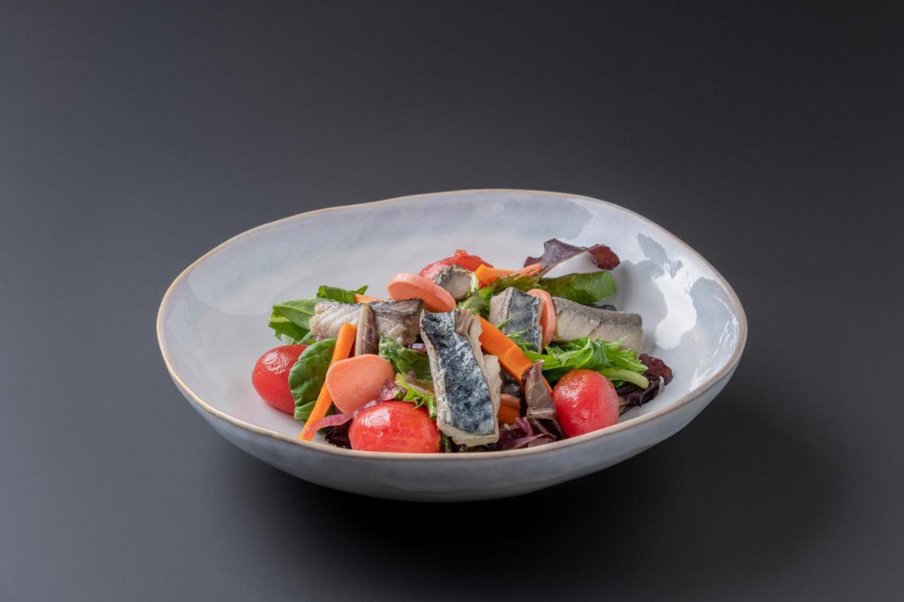 Eurostars Pórtico Alicante Exterior foto A salad with sardines